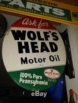 Authentic vintage historical wolf head double sided flange sign