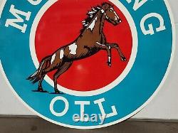 Big Double sided Mustang Oil sign. Porcelain gas dealer station