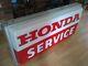 Lighted Double Sided Sign That Displays Honda Service