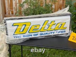 VINTAGE 1990s DELTA TIRE SIGN DOUBLE SIDED ILLUMINATED NEW IN WRAPPING