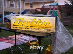 VINTAGE 1990s DELTA TIRE SIGN DOUBLE SIDED ILLUMINATED NEW IN WRAPPING