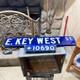 Vintage E. Key West St. 10690 Street Sign Porcelain Double Sided 26'' X6'