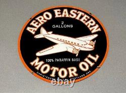 Enseigne en porcelaine double face Vintage 24 de l'avion Aero Eastern pour concessionnaire de carburant et d'huile