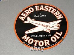 Enseigne en porcelaine double face Vintage 24 de l'avion Aero Eastern pour concessionnaire de carburant et d'huile