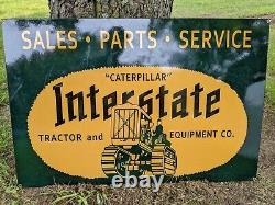 Grande enseigne en métal et porcelaine pour la vente de tracteurs caterpillar sur l'Interstate à double face