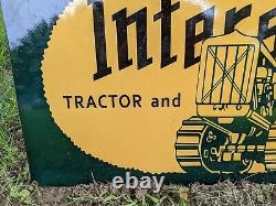 Grande enseigne en métal et porcelaine pour la vente de tracteurs caterpillar sur l'Interstate à double face