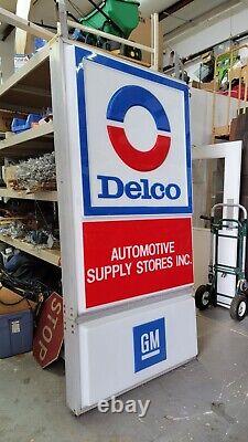 Grands magasins de fournitures automobiles Delco - Enseigne lumineuse double face - GM - 97 x 48