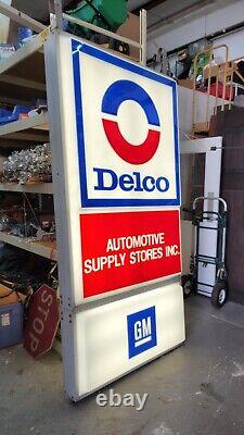 Grands magasins de fournitures automobiles Delco - Enseigne lumineuse double face - GM - 97 x 48